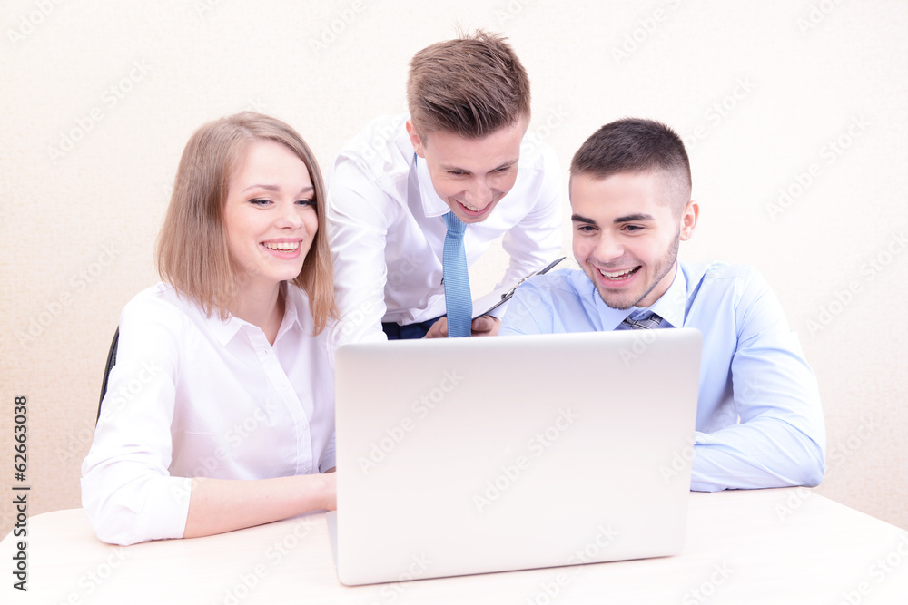 Successful young businesspeople working at office Successful young businesspeople working at office