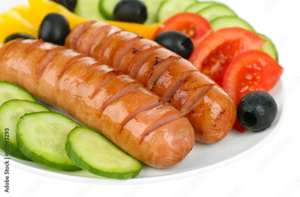 Grilled sausages with vegetables close up Grilled sausages with vegetables close up