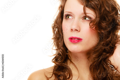 Portrait pretty thoughtful woman curly hair isolated