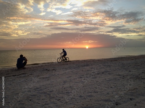 Sunset over the ocean photo