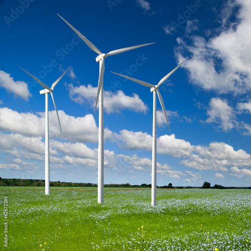 Wind generator turbine on spring landscape