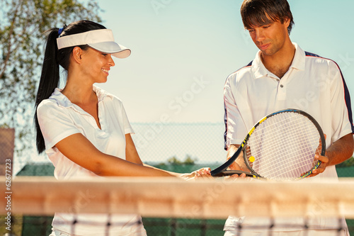 Couple of tennis players © luckybusiness