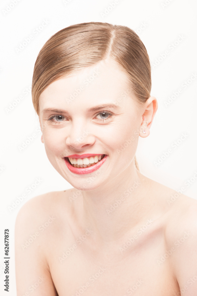 Portrait of beautiful young woman with clean face. High key shot Portrait of beautiful young woman with clean face. High key shot