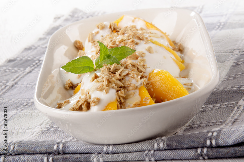 yogurt with mango piece and cereals yogurt with mango piece and cereals
