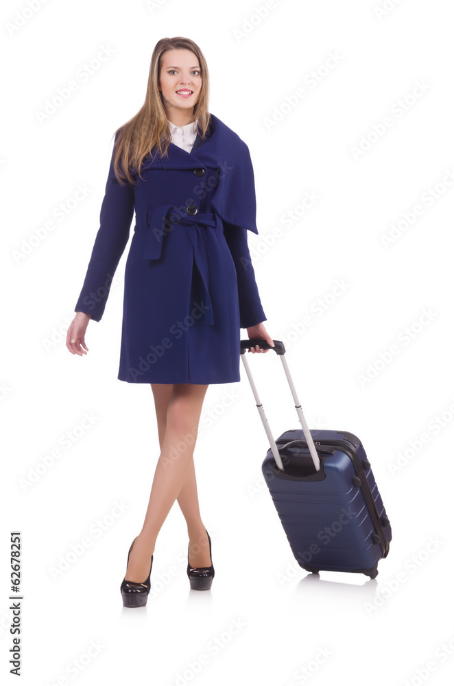 Woman with suitcase preparing for winter vacation Woman with suitcase preparing for winter vacation