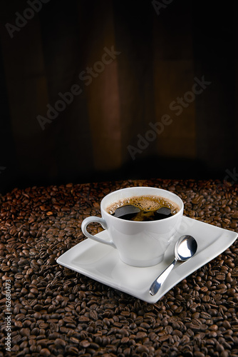 cup of coffee on brown background