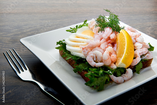 Delicious shrimp salad sandwich on a plate