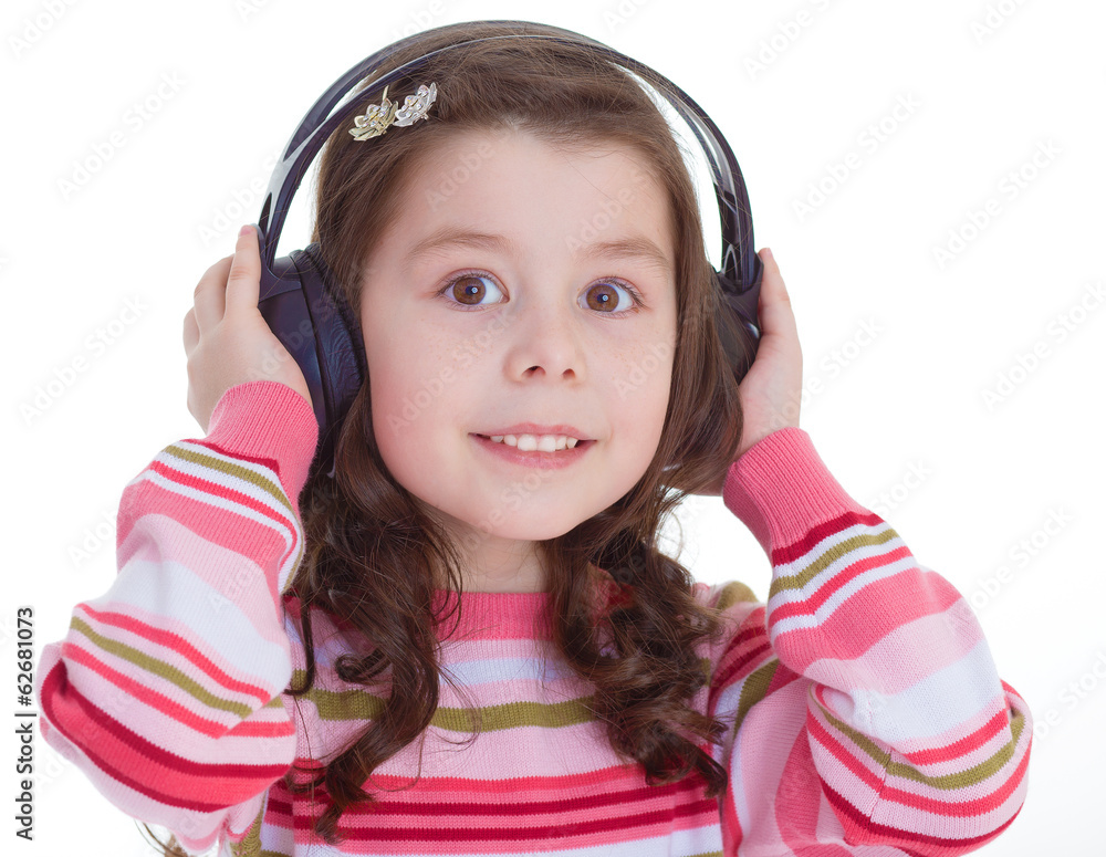 Beautiful cute happy little girl with headphones. Beautiful cute happy little girl with headphones.
