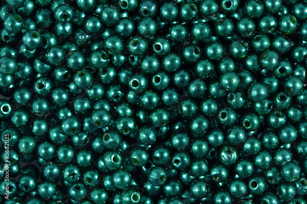 Green glass beads texture for background Green glass beads texture for background