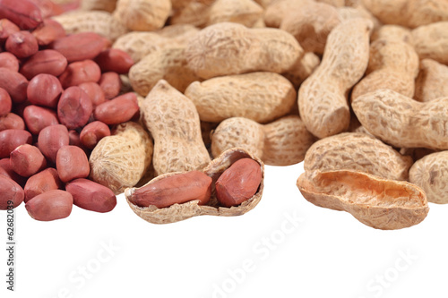 Heap of peanuts on a white