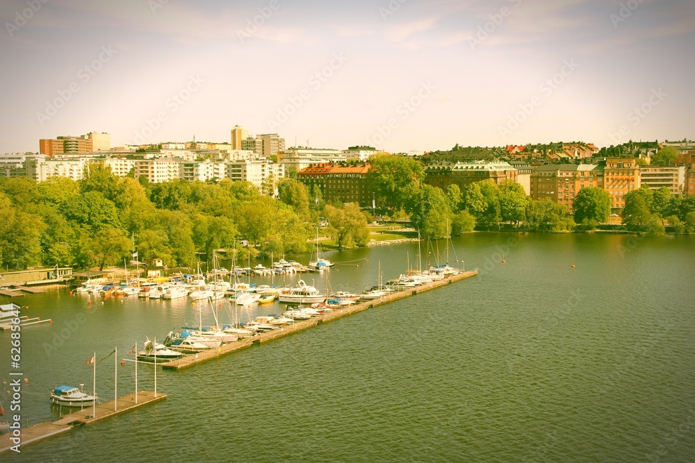 Obraz premium Stockholm - Kungsholmen marina. Cross processed color tone.