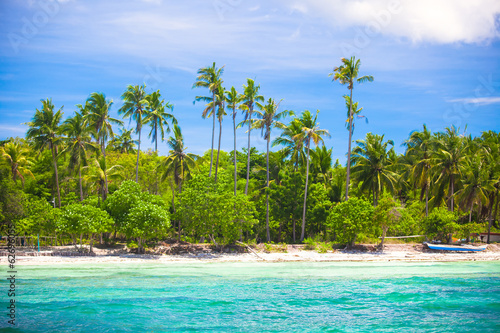 Landscape of tropical island beach with perfect blue sky in © travnikovstudio