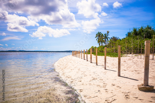 Ideal tropical beach with turquoise water and white sand on a