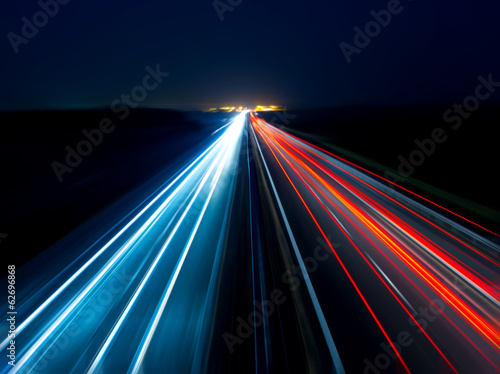 Blurry abstract photo of the lights of cars