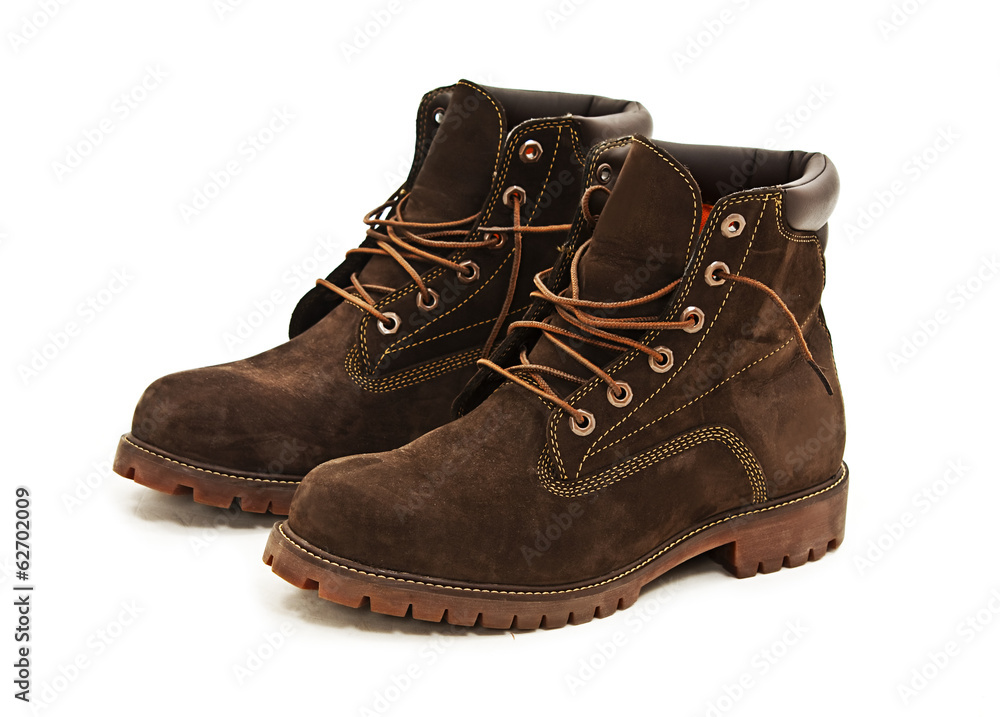 Photo of man's boots on white background Photo of man's boots on white background