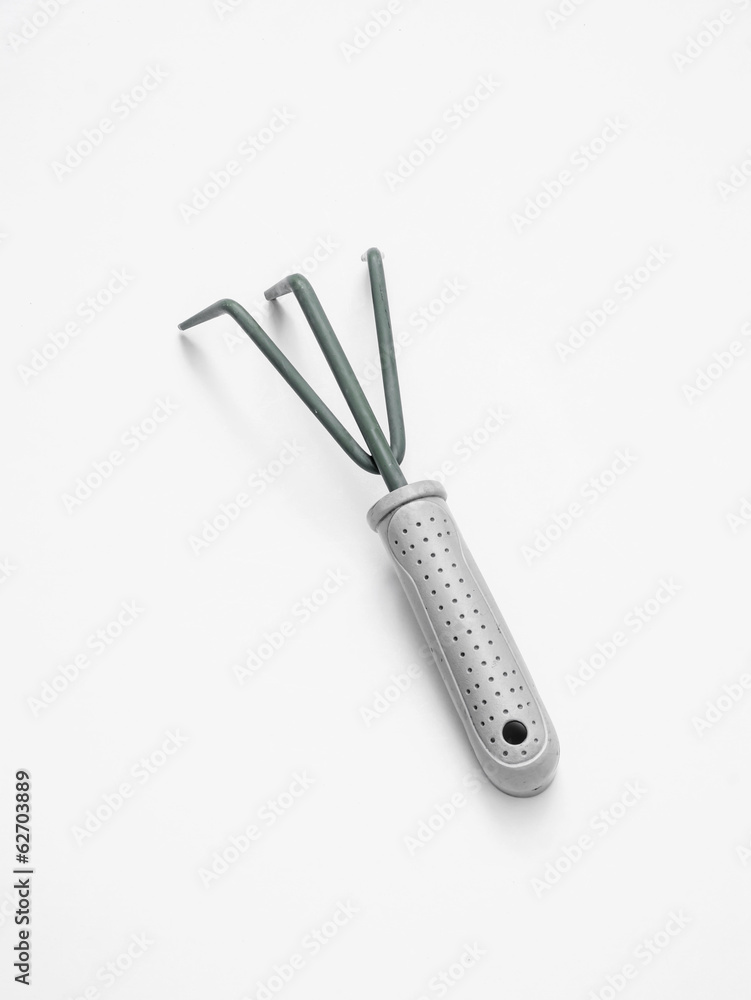 Garden rake on white background Garden rake on white background
