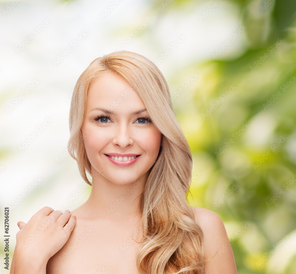 face and shoulders of happy woman with long hair face and shoulders of happy woman with long hair