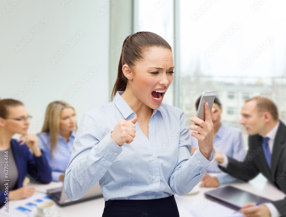 screaming businesswoman with smartphone screaming businesswoman with smartphone