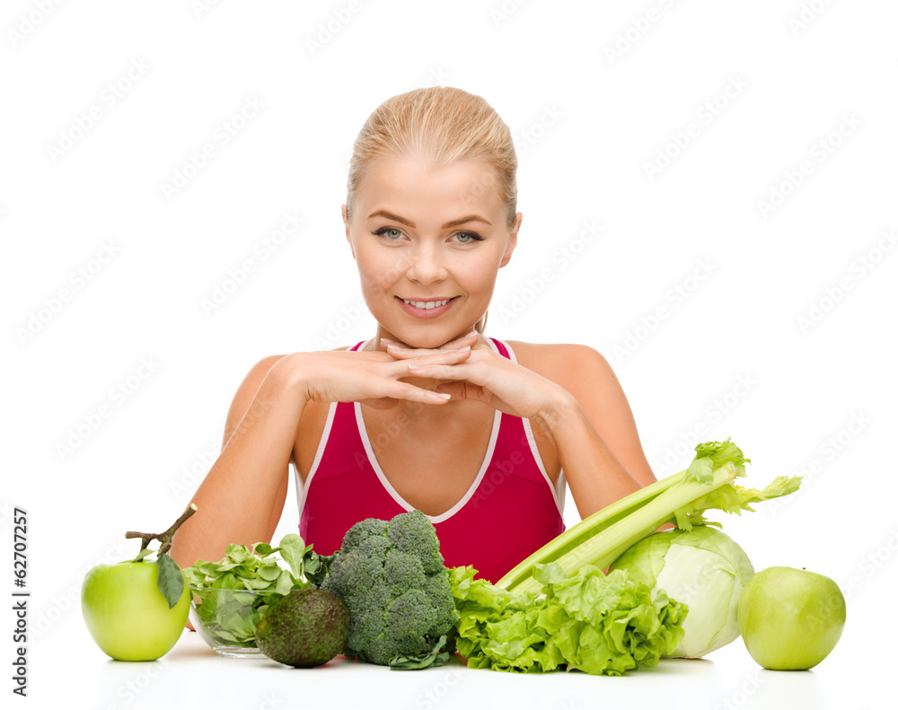 smiling sporty woman with organic food smiling sporty woman with organic food