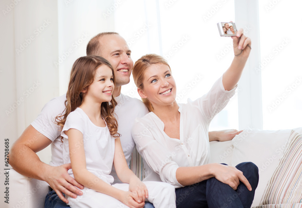 happy family with little girl making self portrait happy family with little girl making self portrait