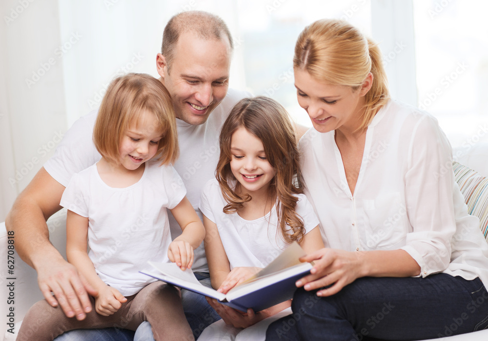 smiling family and two little girls with book smiling family and two little girls with book