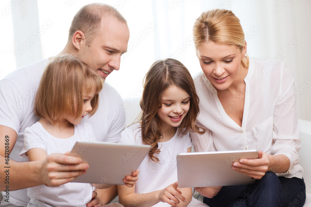 family and two kids with tablet pc computers family and two kids with tablet pc computers