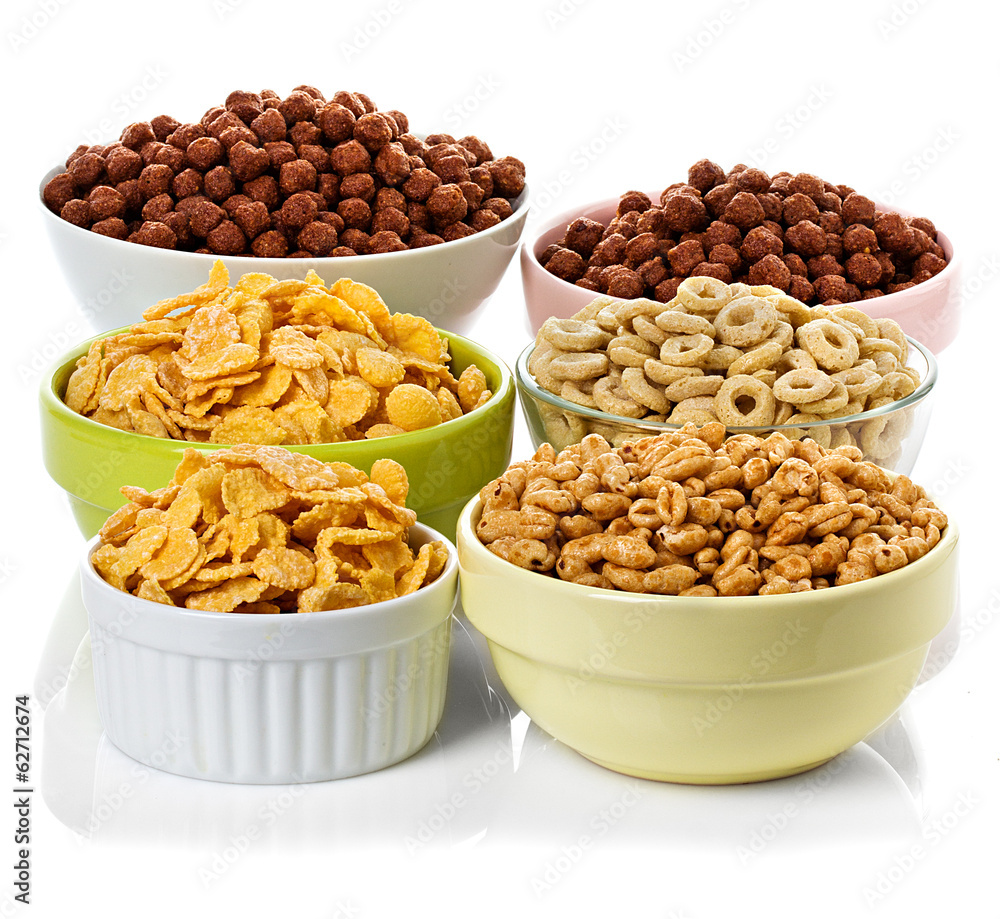 assortment dry cereal, flakes for breakfast, isolated on white assortment dry cereal, flakes for breakfast, isolated on white