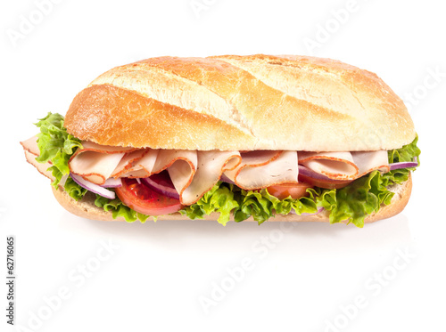 Crusty French baguette with sliced chicken