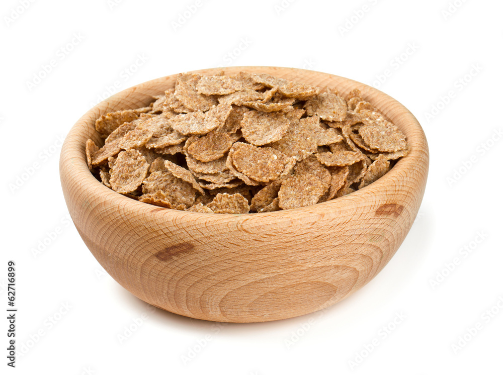 pile of bran flakes isolated on white pile of bran flakes isolated on white