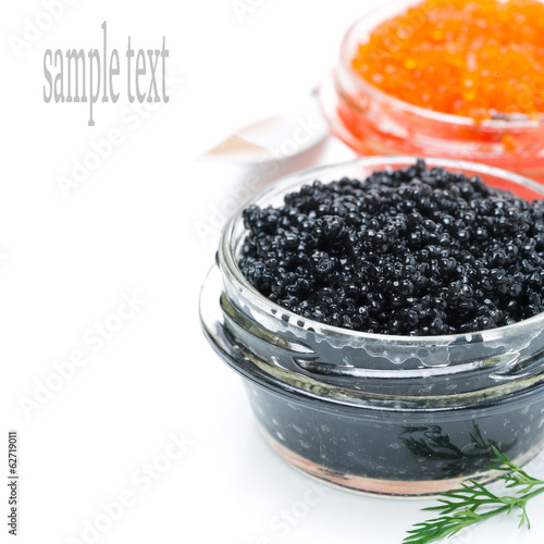 delicious black caviar in a glass jar, isolated