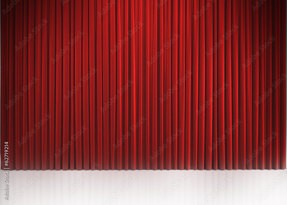 Red closed curtain with light spots in a theater Red closed curtain with light spots in a theater
