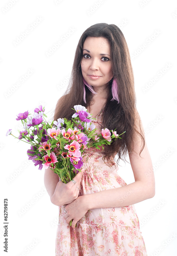 Beautiful girl with flowers on a white background