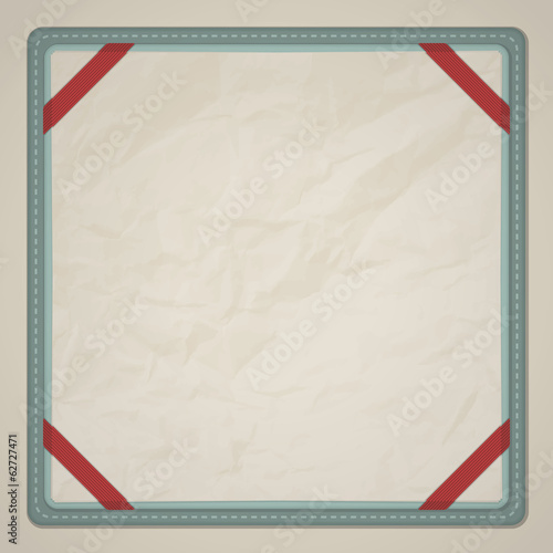 Square desk notepad with textured sheets of paper held down with