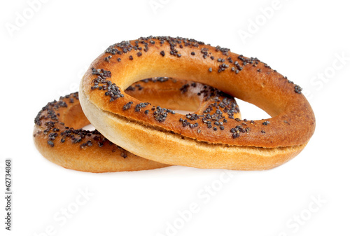 Bagels with poppy seeds isolated on white background © domnitsky