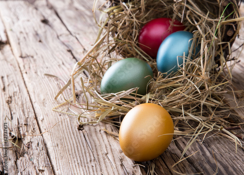 Easter eggs on wooden background