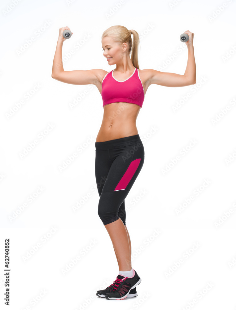 young sporty woman with light dumbbells young sporty woman with light dumbbells