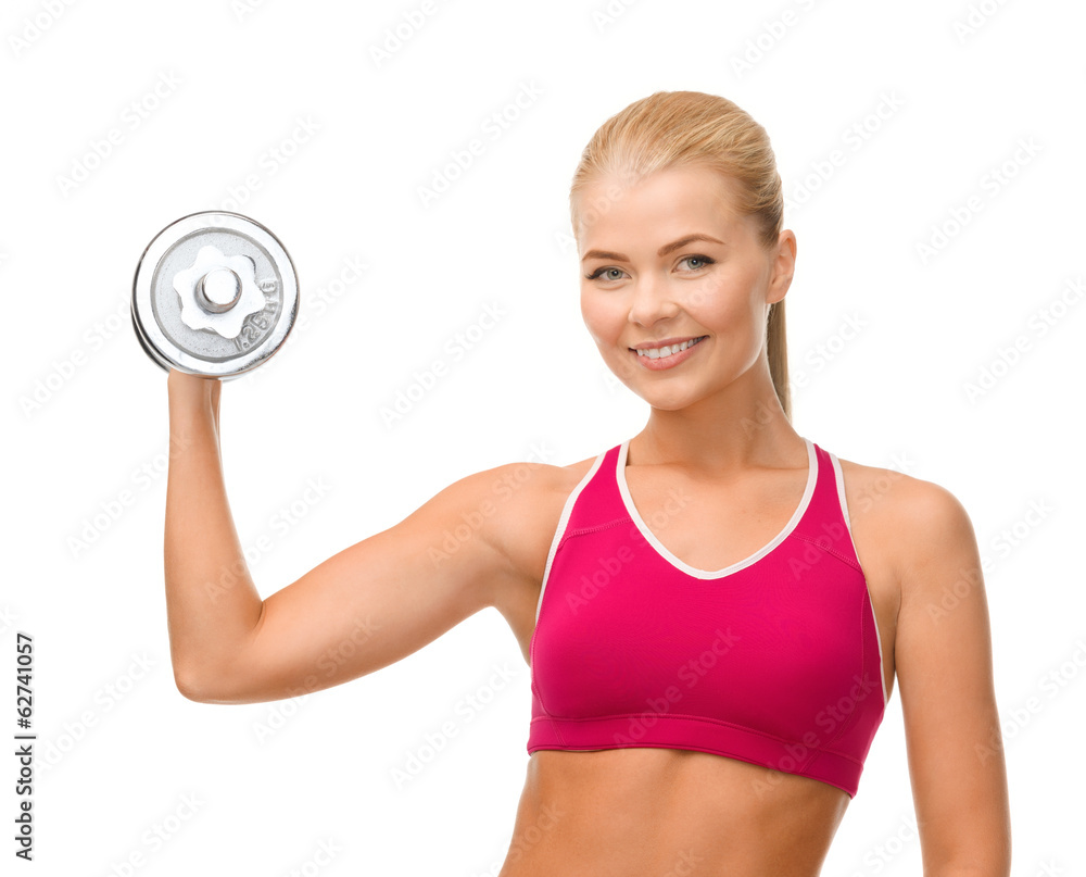 smiling woman with heavy steel dumbbell smiling woman with heavy steel dumbbell