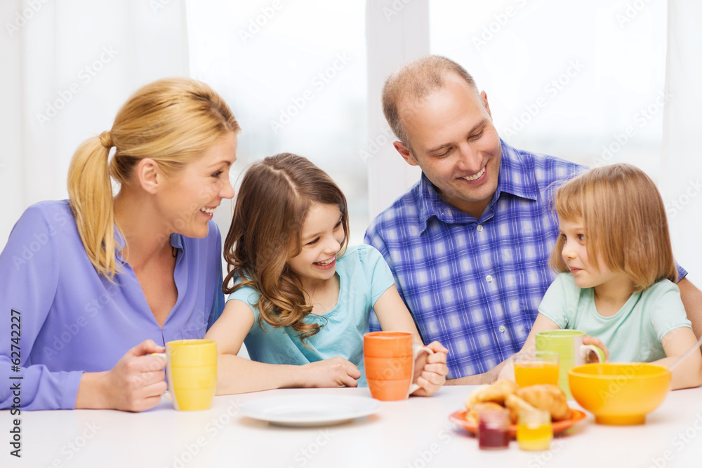 happy family with two kids with having breakfast happy family with two kids with having breakfast