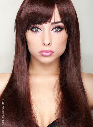 Makeup long hair girl looking. Closeup portrait