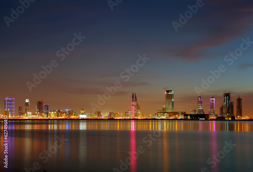 Beautiful illumination of Bahrain skyline at sunset