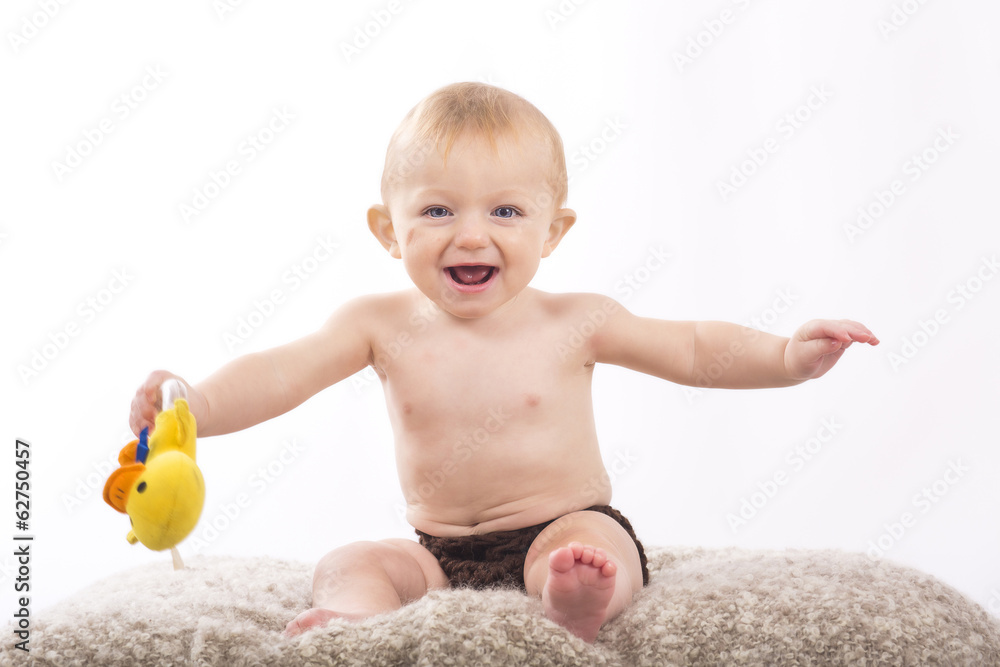 Portrait of sitting little baby boy on a white background Portrait of sitting little baby boy on a white background