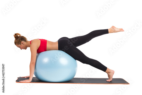 Female Exercise On Fitness Ball