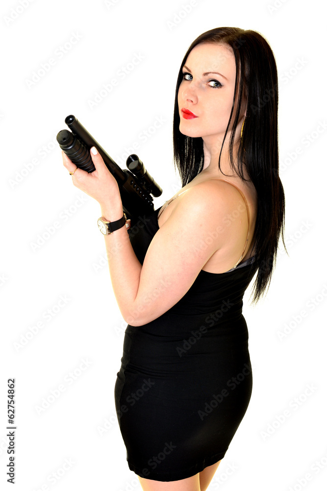 Belle femme avec une arme à feu