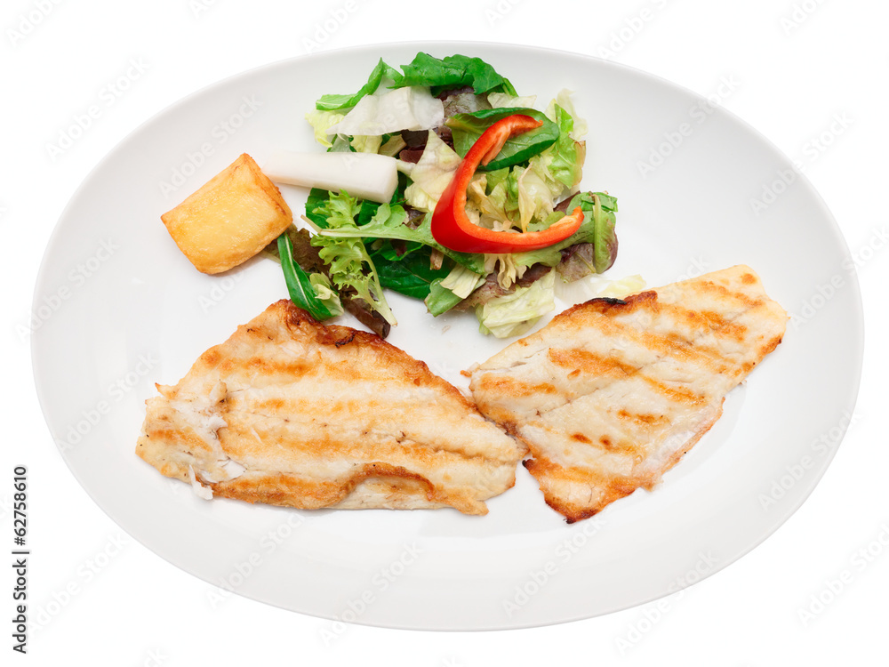 Grilled seabass fillet in plate, isolated Grilled seabass fillet in plate, isolated
