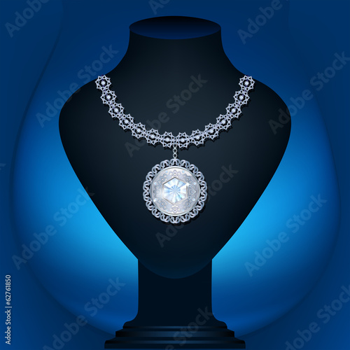 mannequin jewelry backlit with a blue background