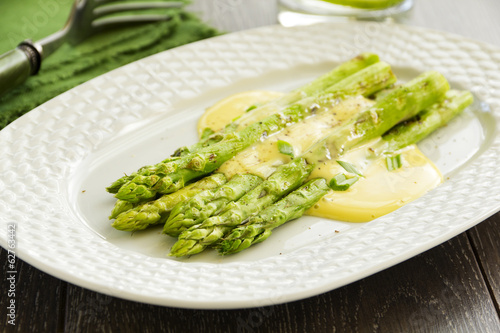 Grilled asparagus with hollandaise sauce.