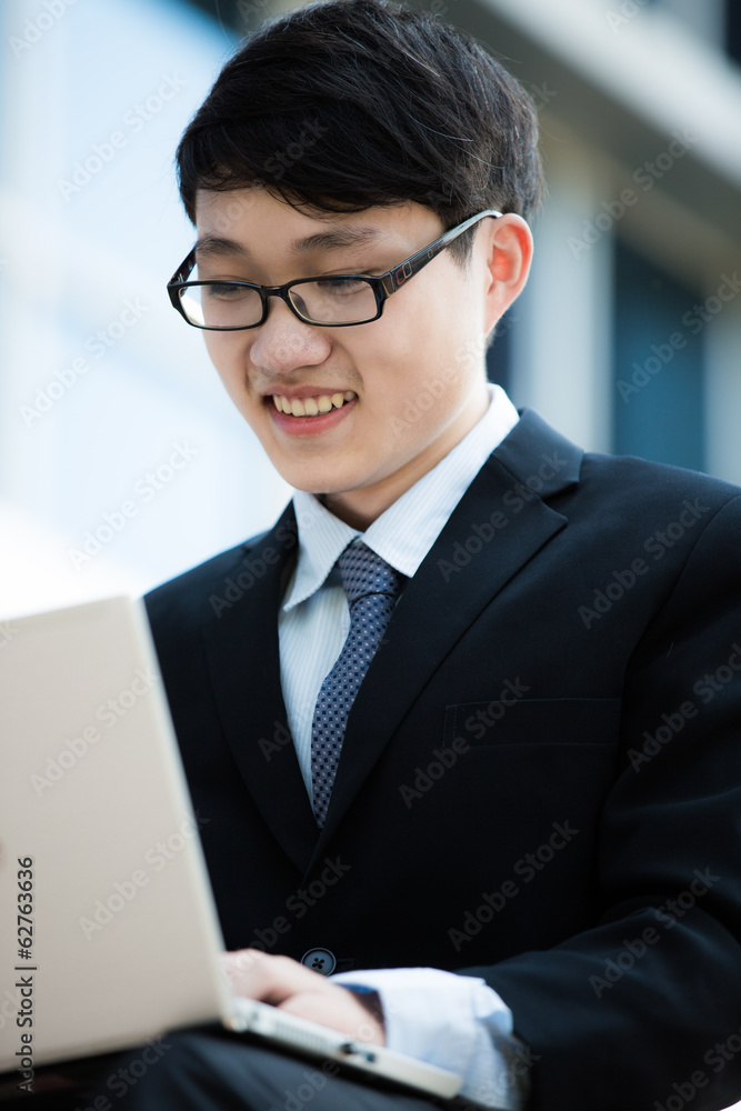 young businessman working outside young businessman working outside