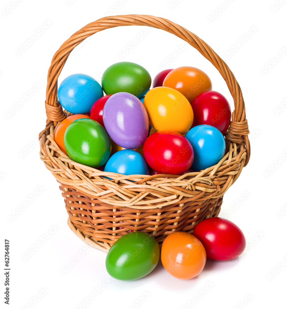 Easter eggs in wicker basket Easter eggs in wicker basket
