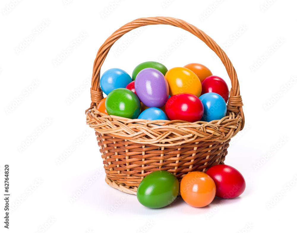 Easter eggs in wicker basket Easter eggs in wicker basket