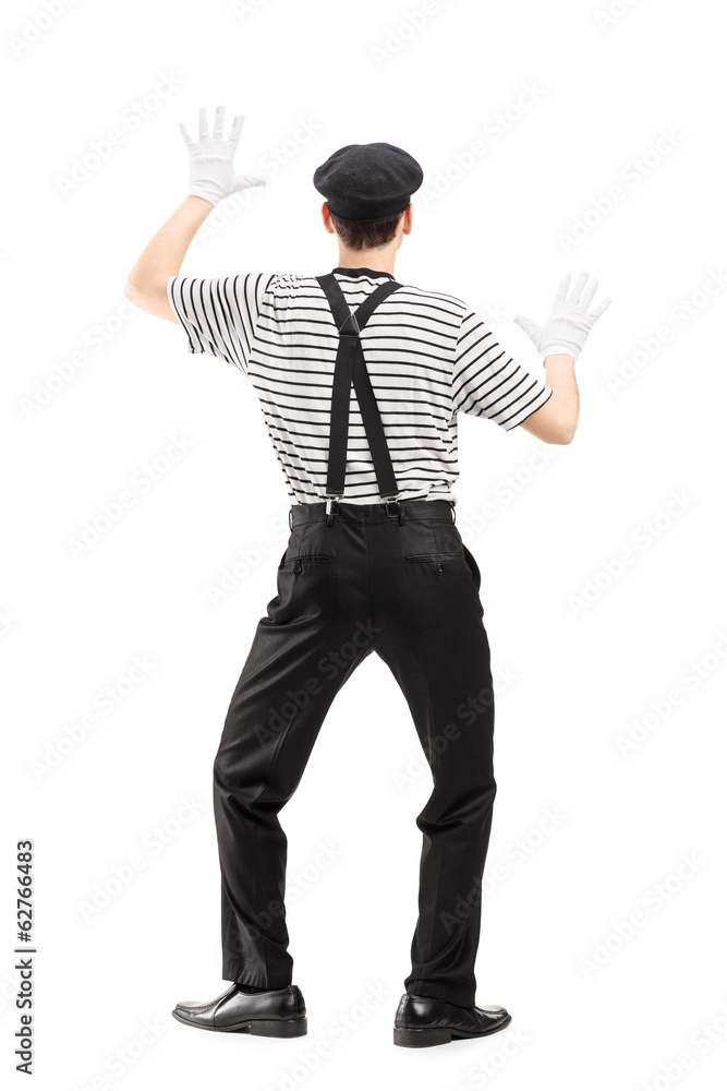 Full length portrait of a mime artist performing Full length portrait of a mime artist performing